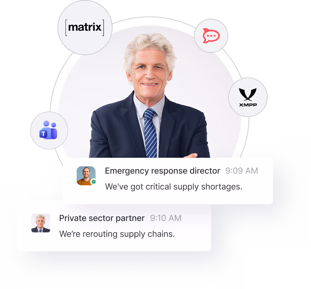 Smiling older man in a suit and striped tie with chat bubbles discussing critical supply shortages and rerouting supply chains, surrounded by communication platform logos including Matrix, Microsoft Teams, and XMPP.