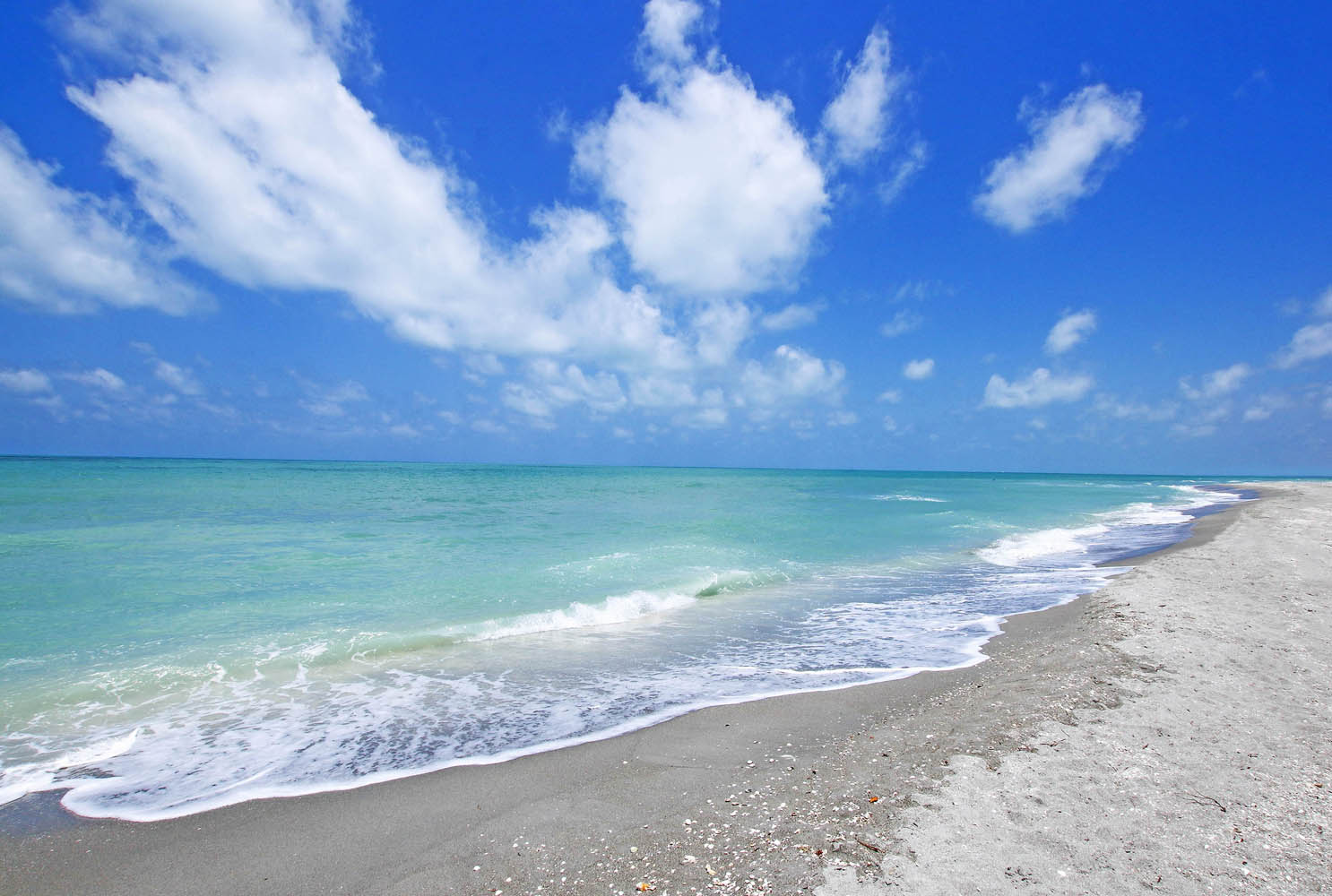 Turquoise Gulf water and white sand