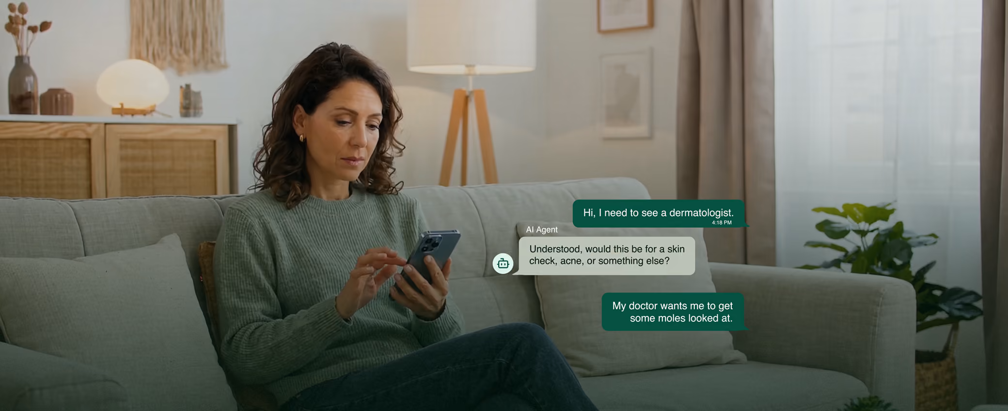 A woman on her couch texting an AI agent to book a dermatologist appointment