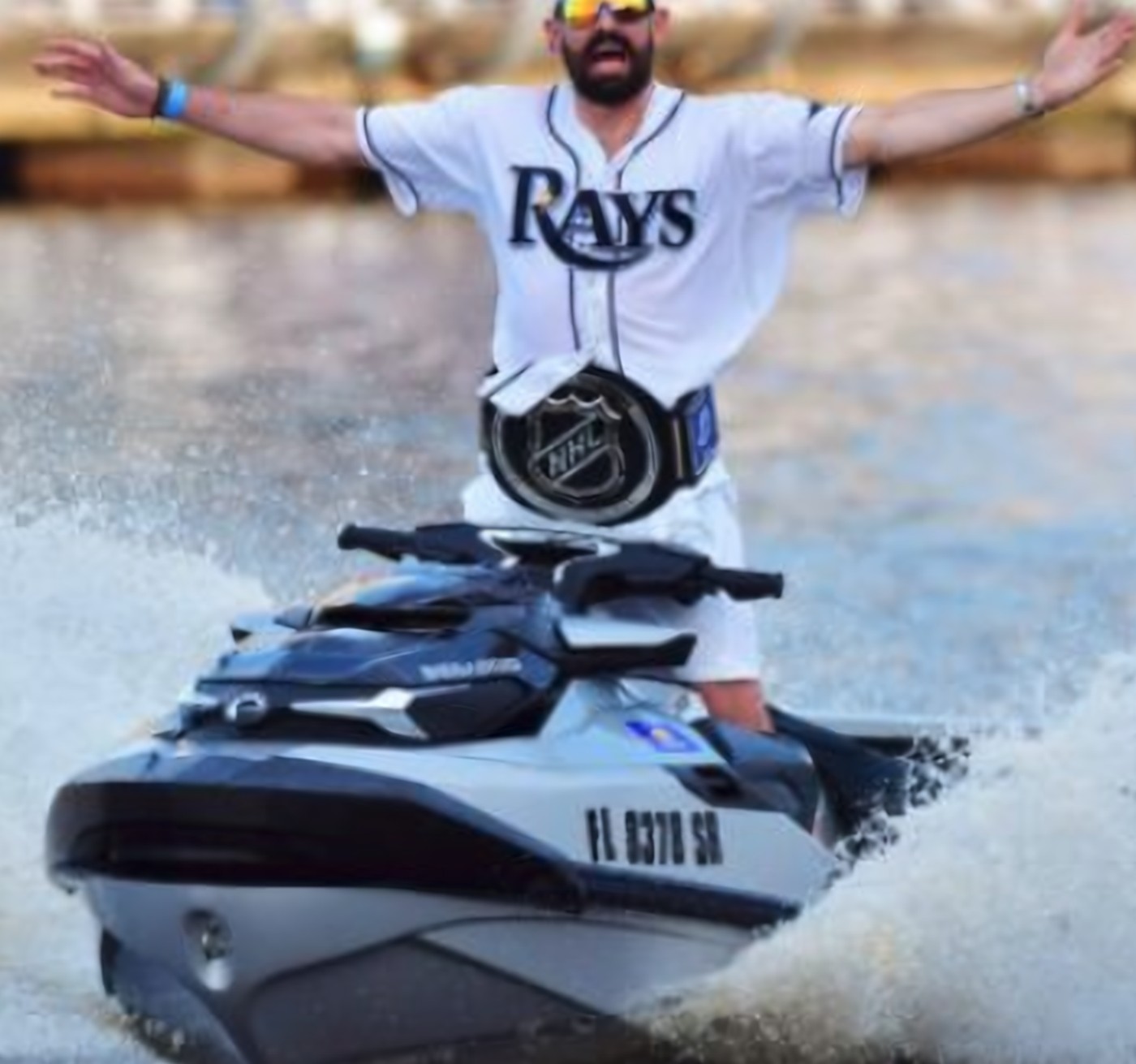 Rays jersey and NHL title belt on a Sea-Doo