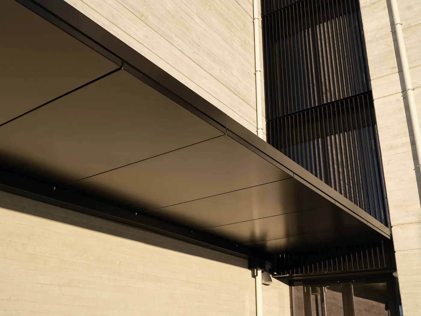 The underside of the canopy beside the louvres
