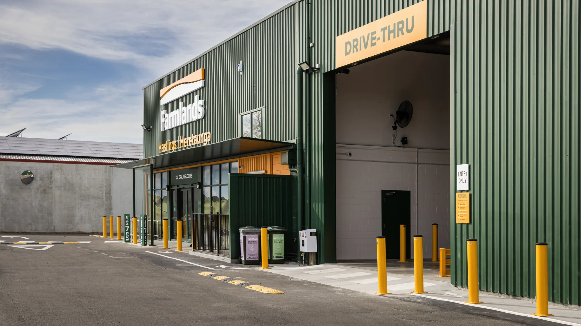 The store frontage from the drive-thru end, with the canopy along it