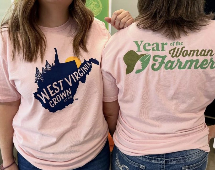 Pink shirts printed with West Virginia Grown and Year of the Woman Farmer