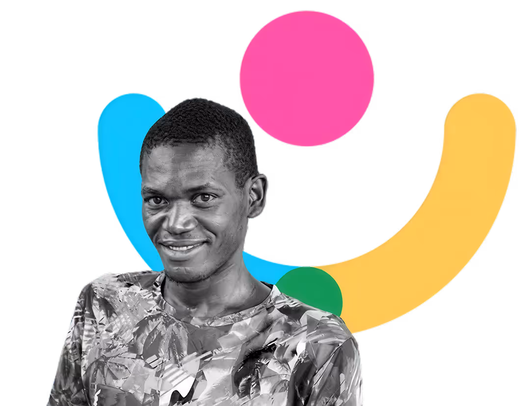 Smiling young man in a patterned shirt, in black and white, set against colourful WHO Foundation brand shapes