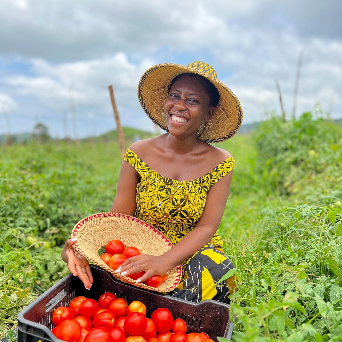 A farmer with her harvest