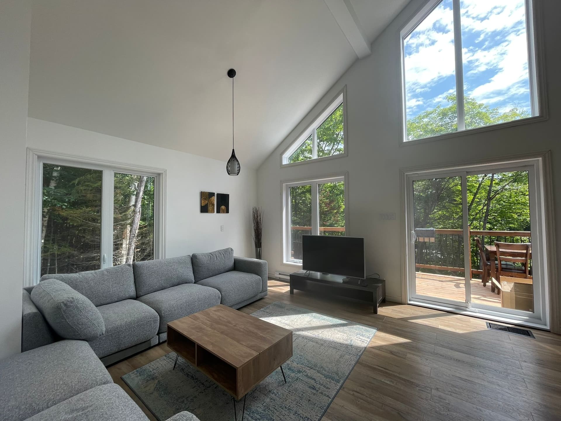 Bright living room with high ceilings