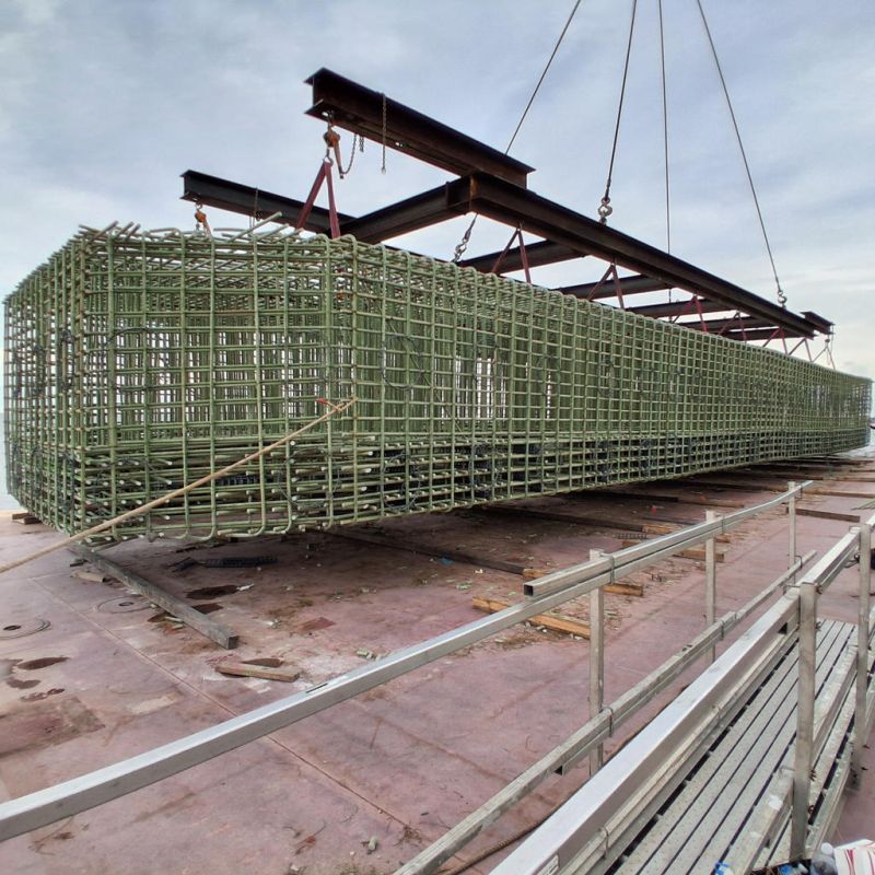 Alligator River Bridge under construction, its concrete deck carried on piers across open water, eastern North Carolina, 2020