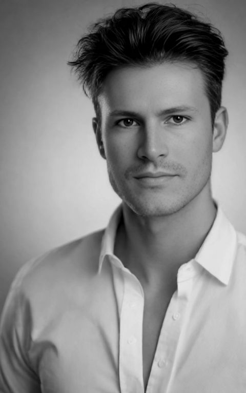 James McCoy, founder of Omni Aviation, black and white portrait
