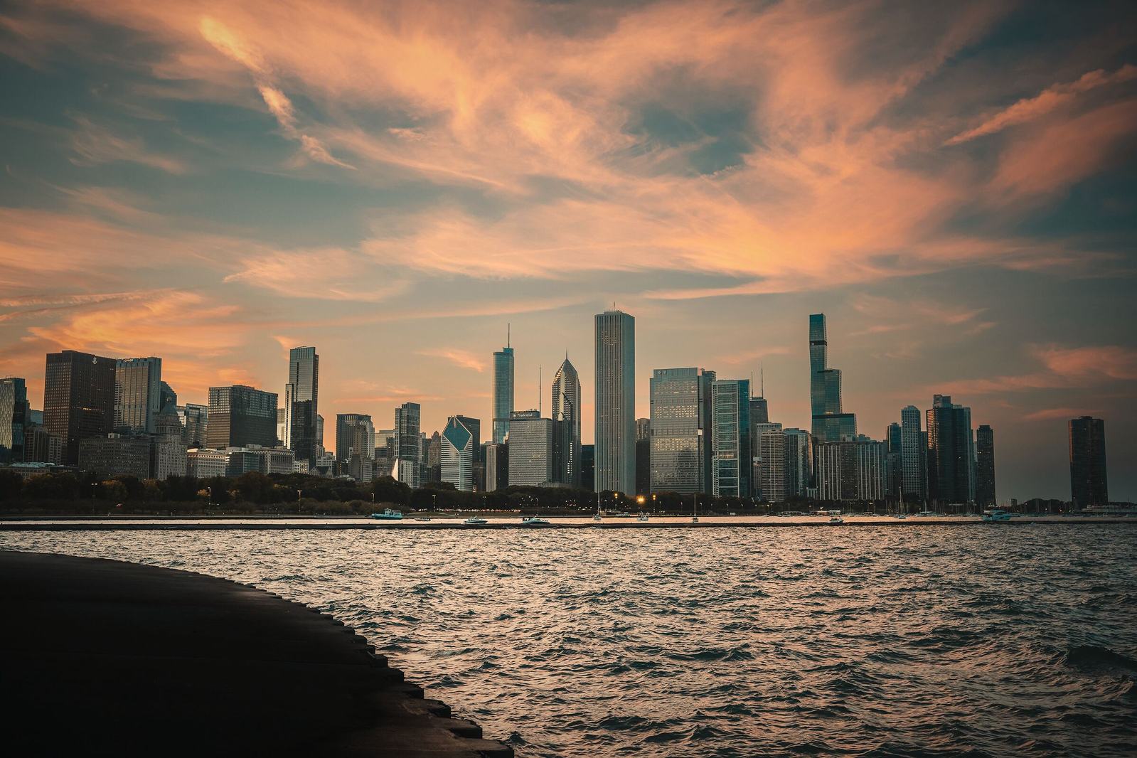 Chicago skyline across Lake Michigan at sunset