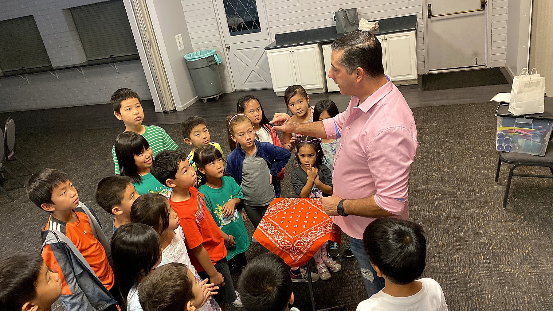 JamesZini teaching students in a hands-on magic class