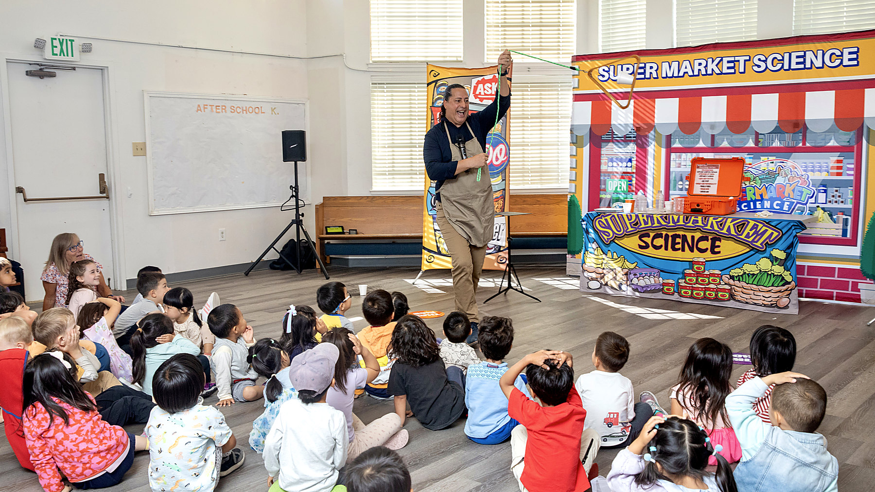 JamesZini presenting an educational assembly to an audience