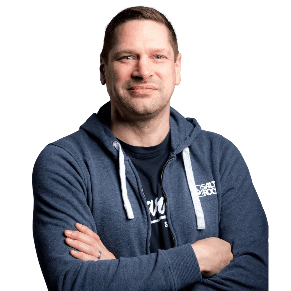 Robin Waite, co-founder of Five Valleys AI, smiling with his arms folded