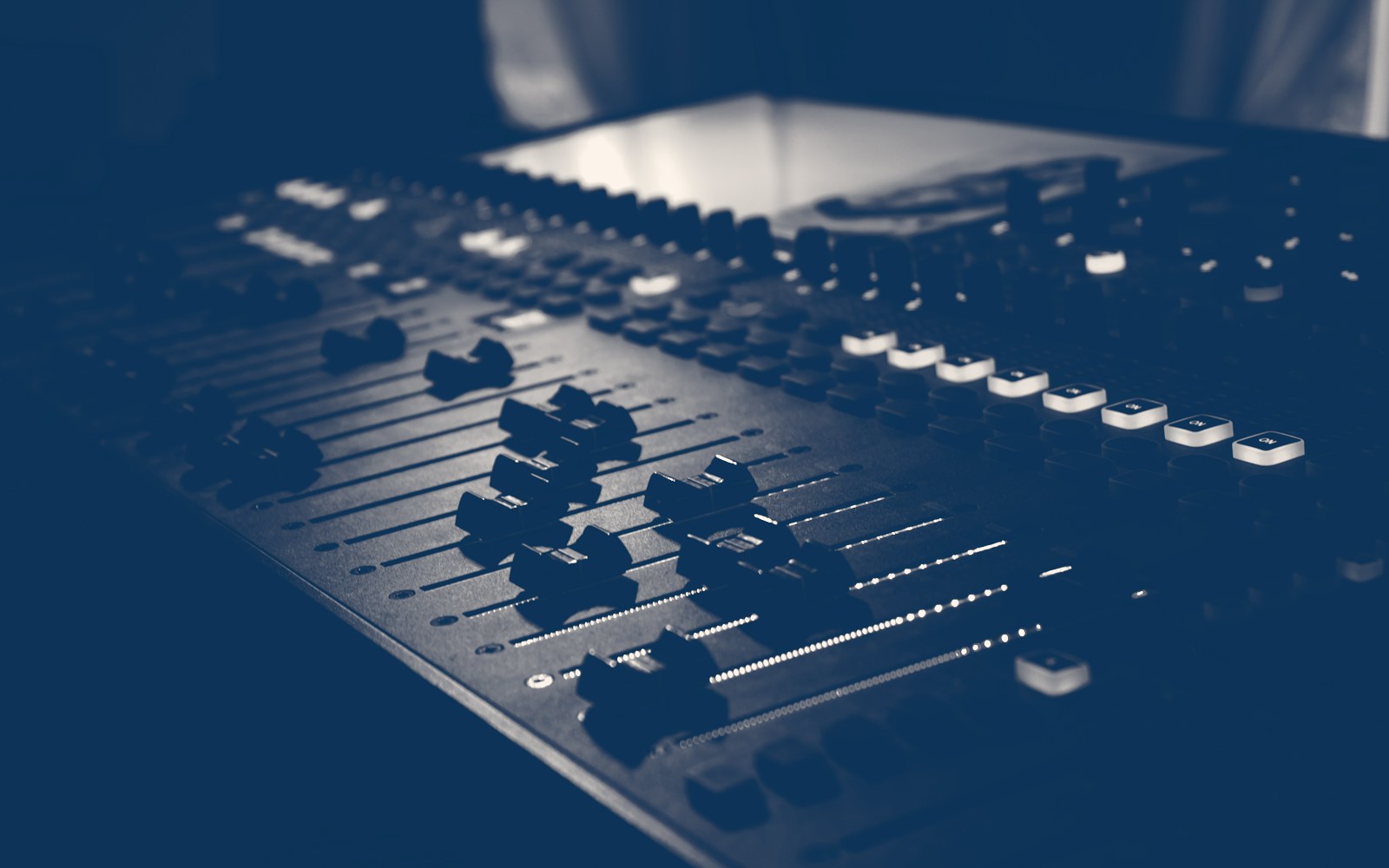 Broadcast mixing console, blue on warm