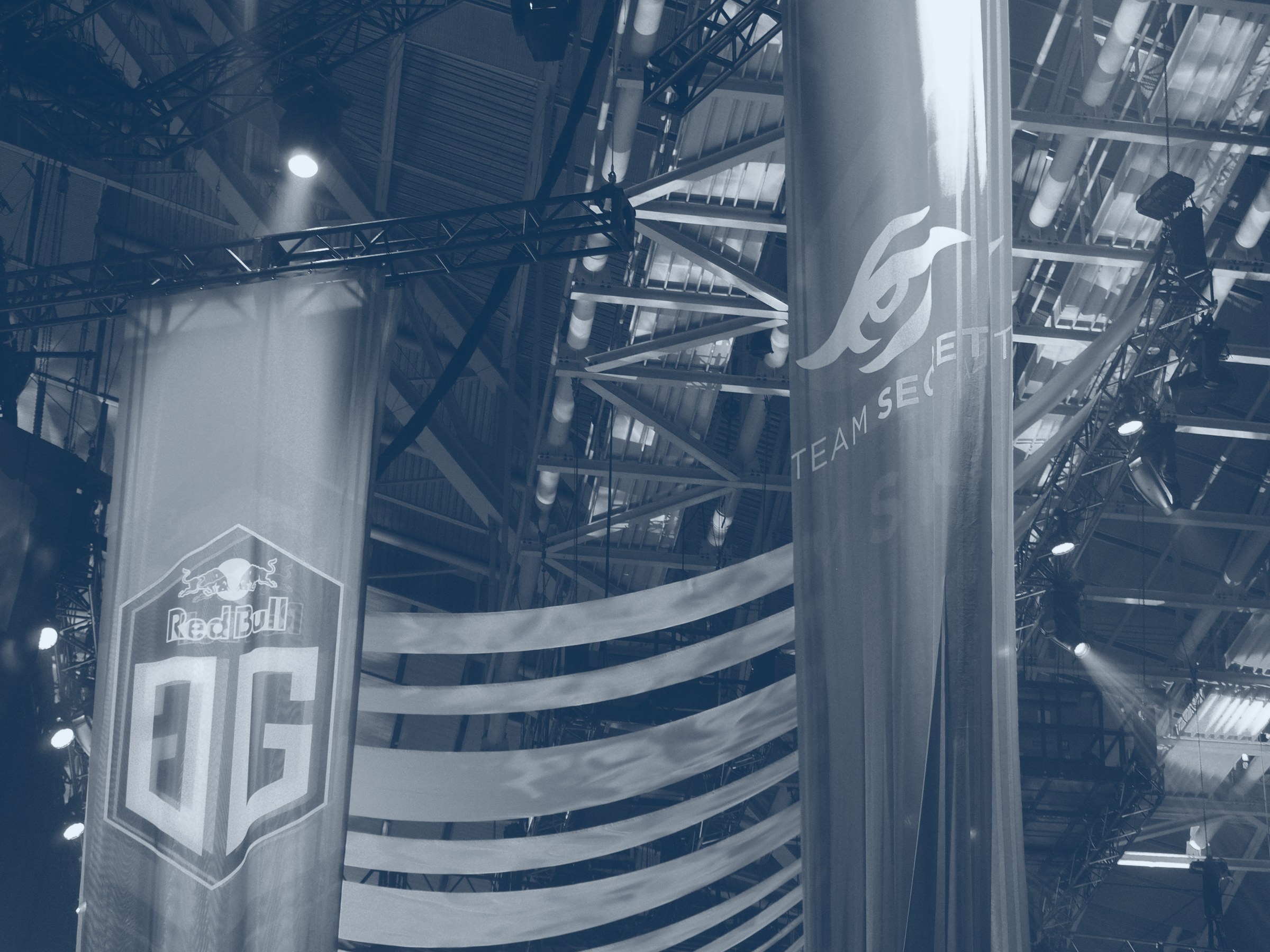 Esports arena with team banners, representing global game communities and markets