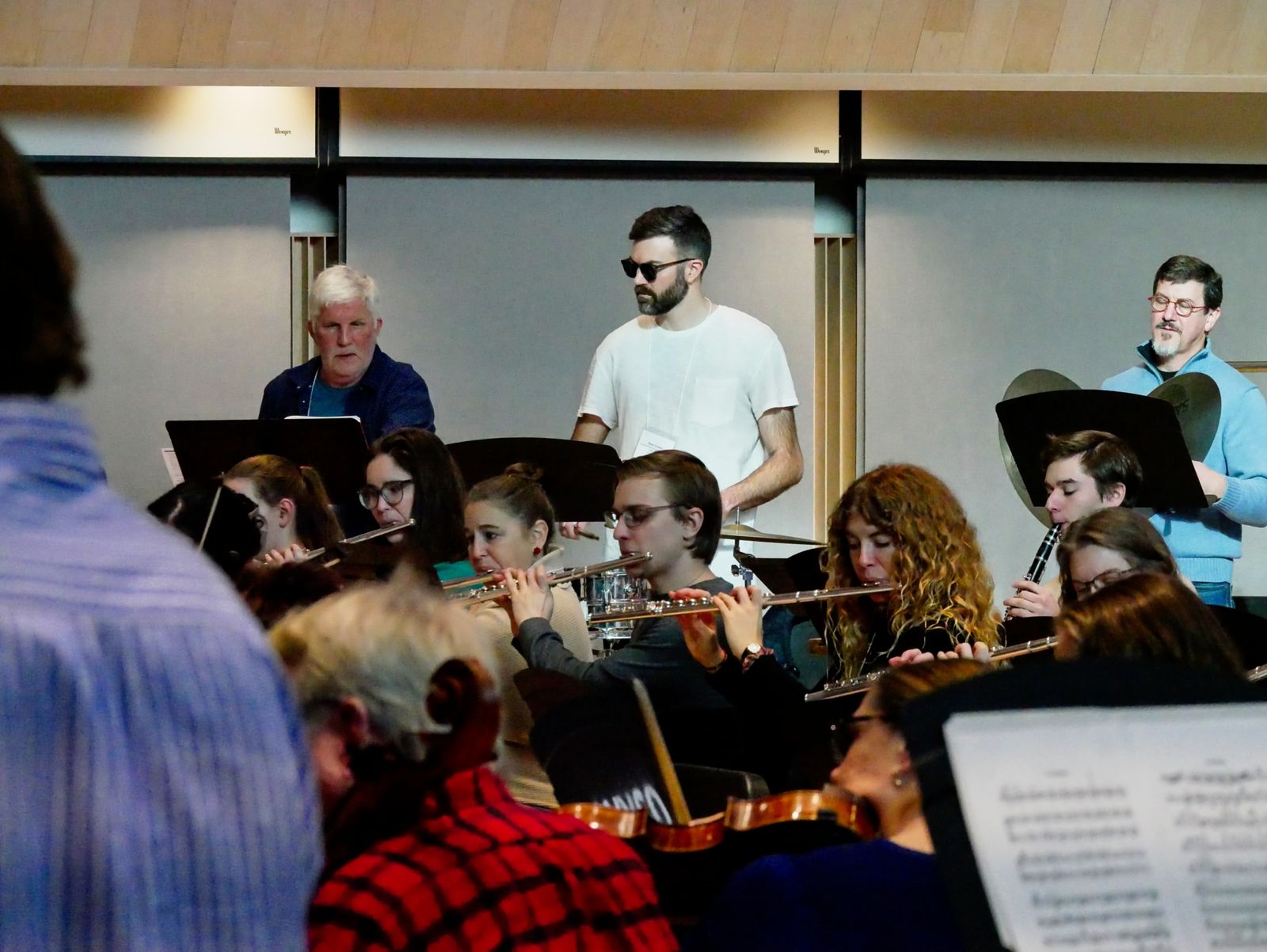 Wind players reading together in a lab ensemble
