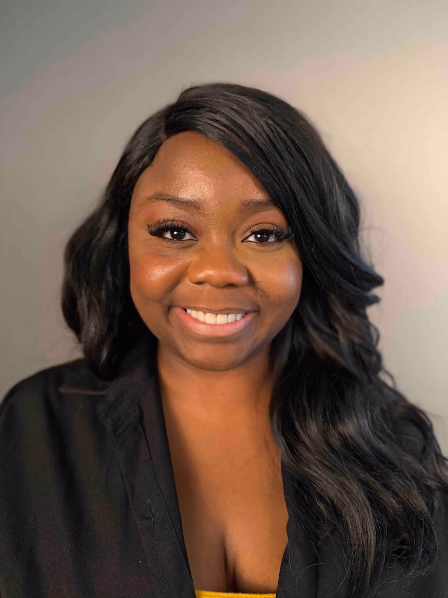 Veneer patient smiling after treatment at City of Angels Dentistry in Downtown Los Angeles