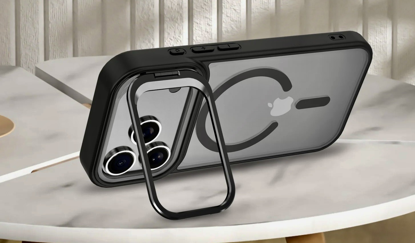 Black MagSafe phone case with fold-out camera ring kickstand standing on a marble table
