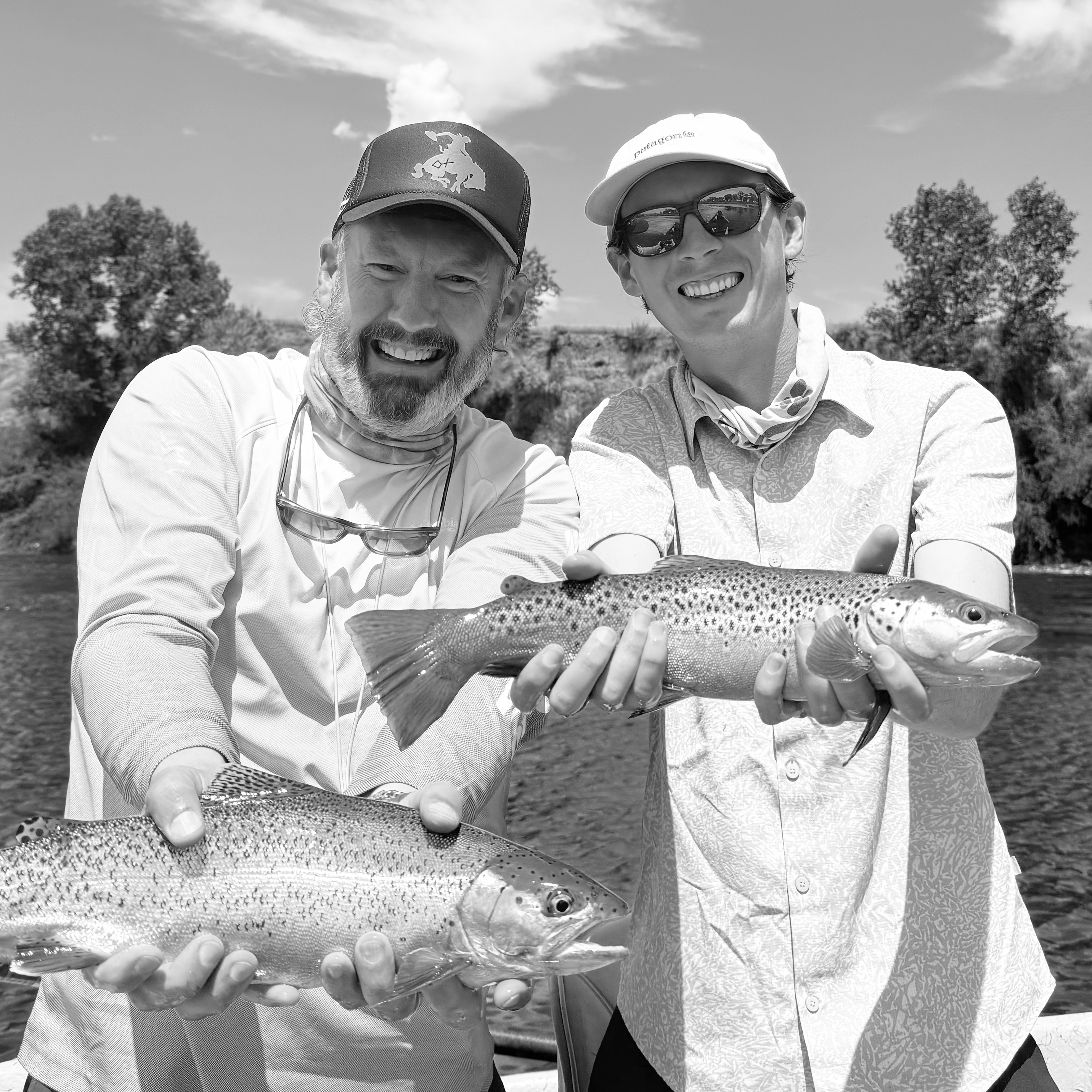 Bruce and Connor Smith holding trout on the Bighorn River in Montana