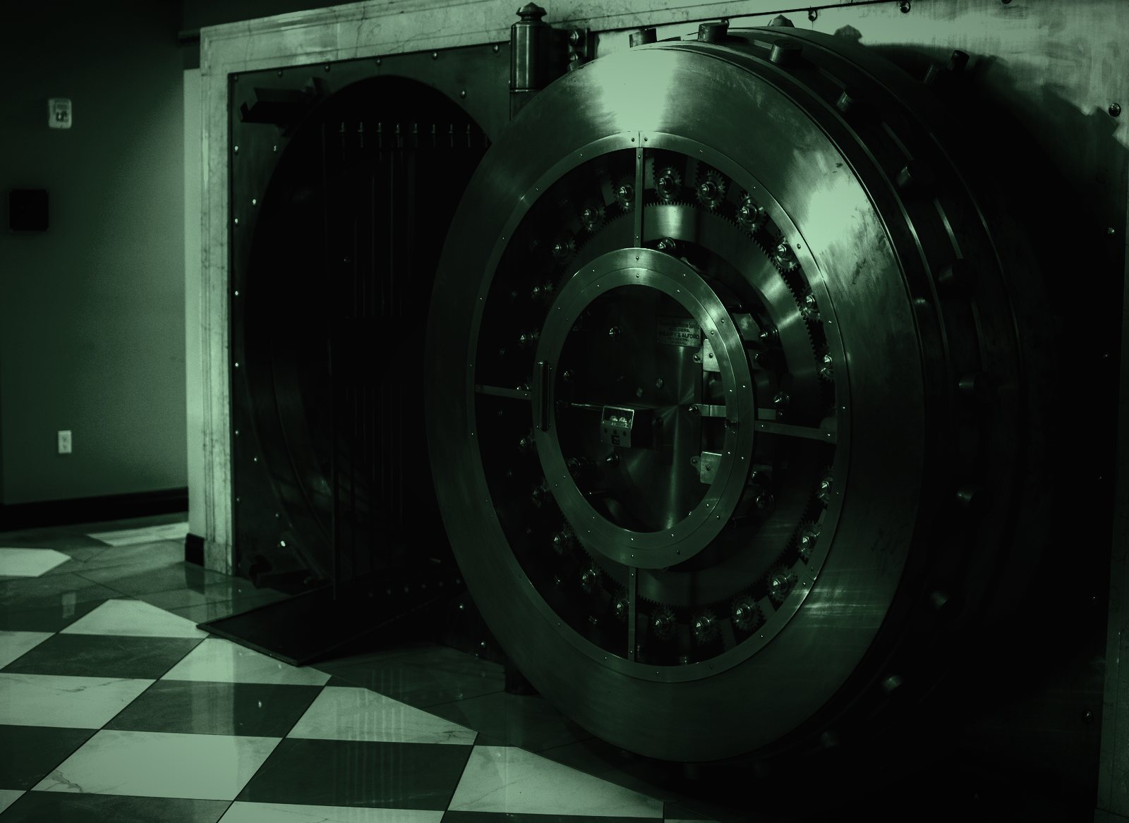 Open bank vault door, in dark green tones