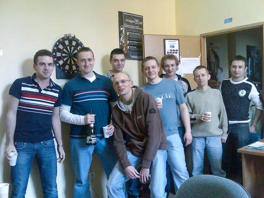 The early CentrumXP team toasting with champagne in their office, 2007