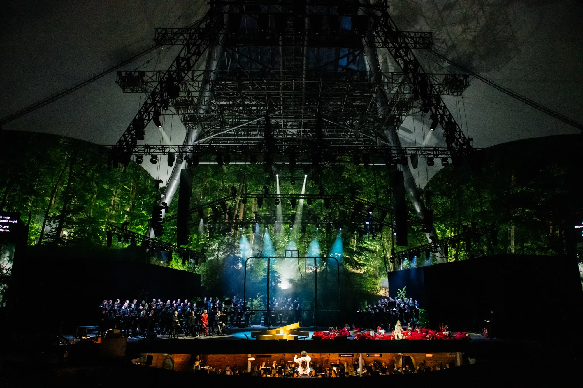 Evening performance at the Forest Opera in Sopot with green stage lighting, Baltic Opera Festival