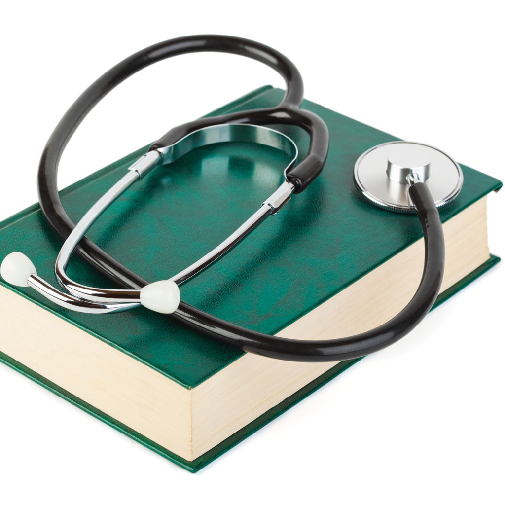 Medical textbook with a stethoscope resting on top