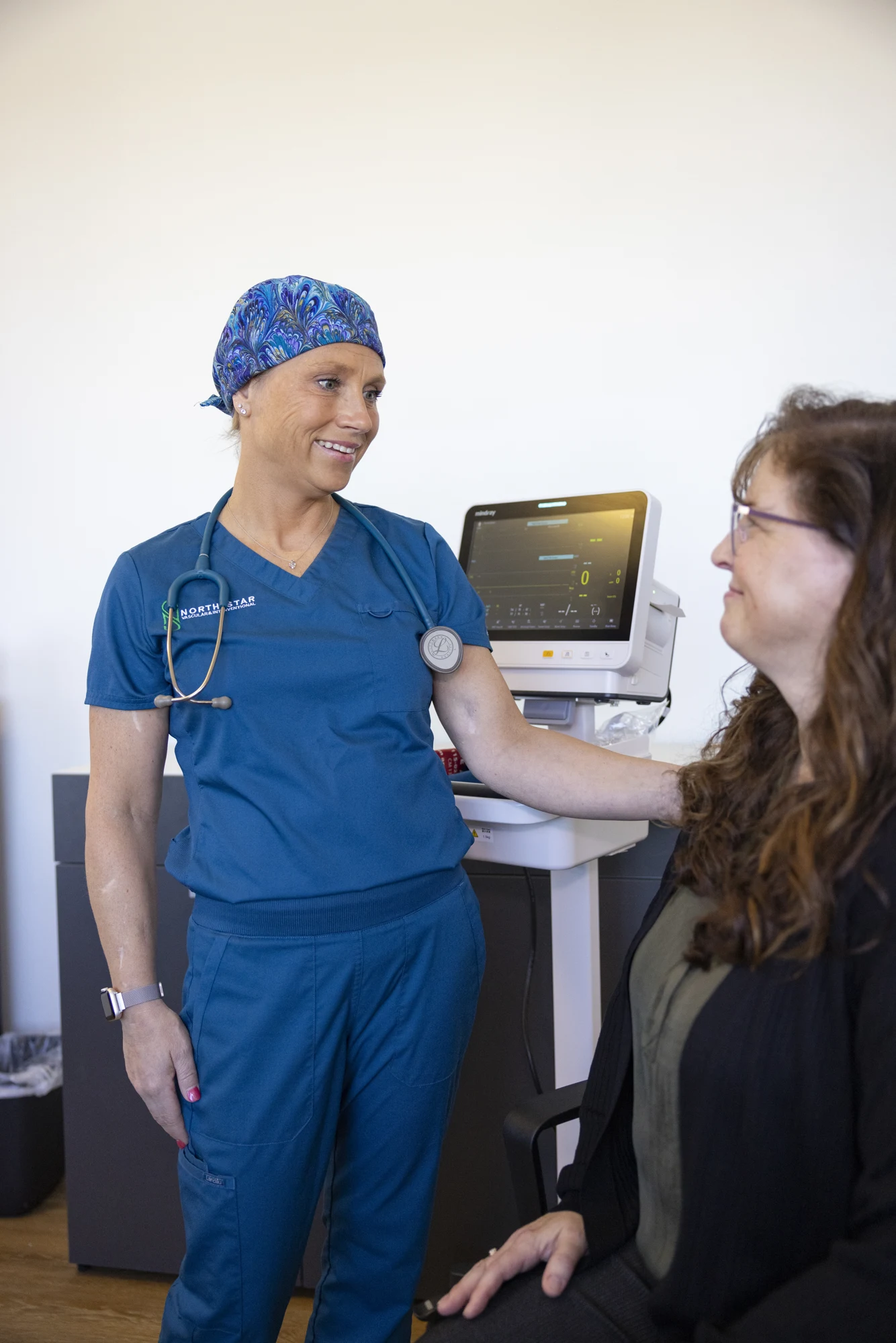 North Star care team member speaking with a patient
