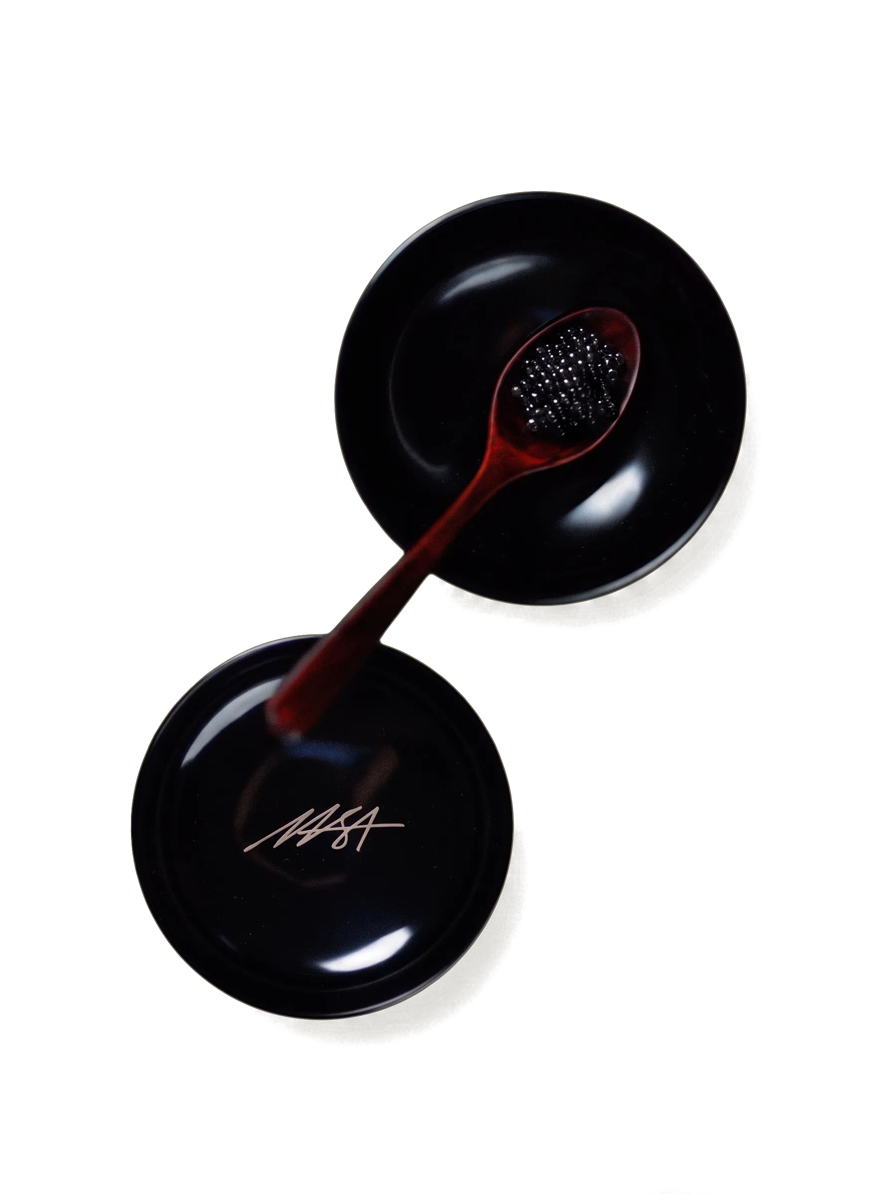 Two black lacquer bowls with the Masa mark, and a spoon of caviar