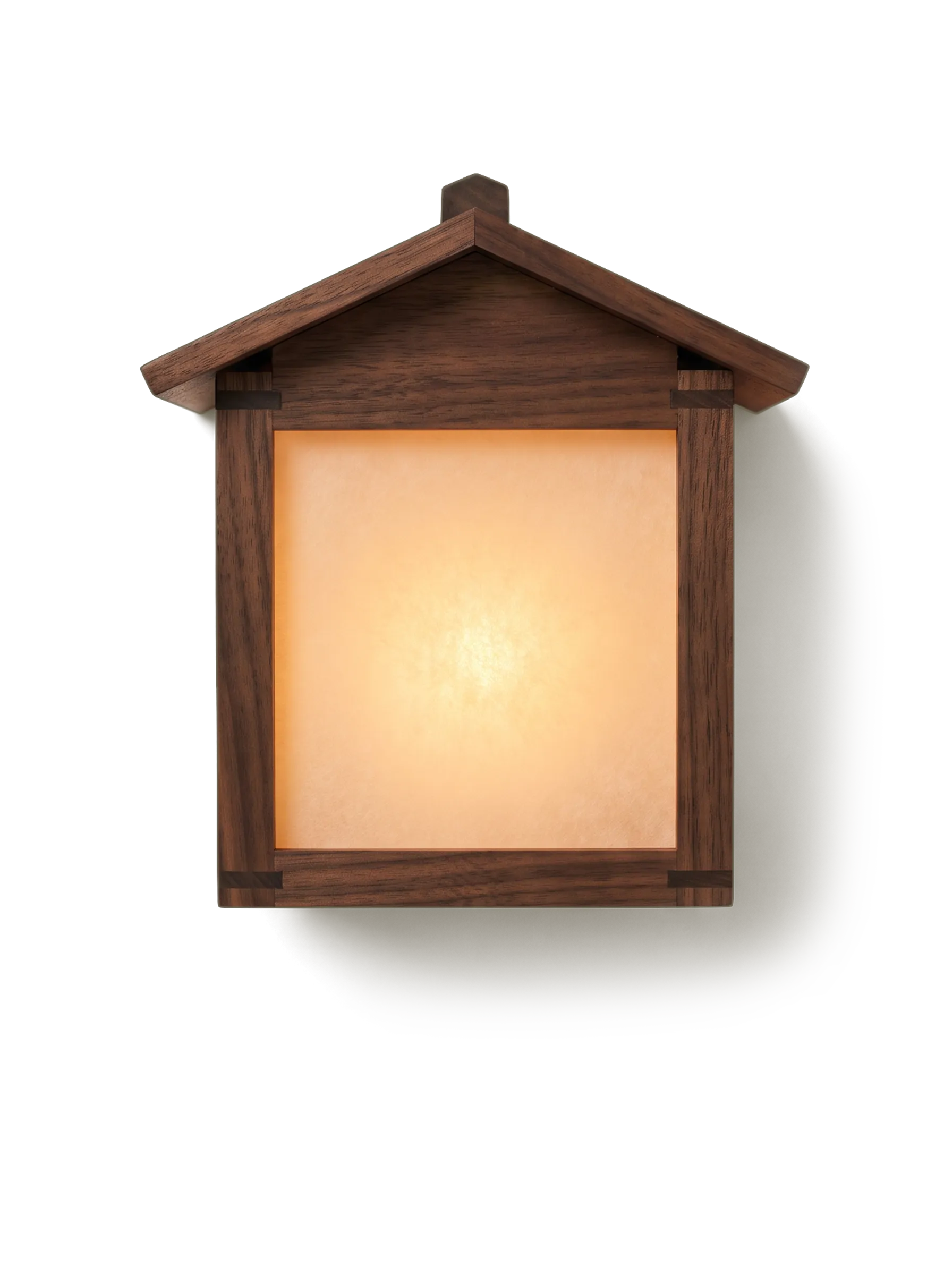 A wooden Obon lantern glowing from within