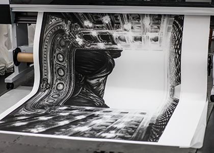 Large-format printer producing a black and white artwork