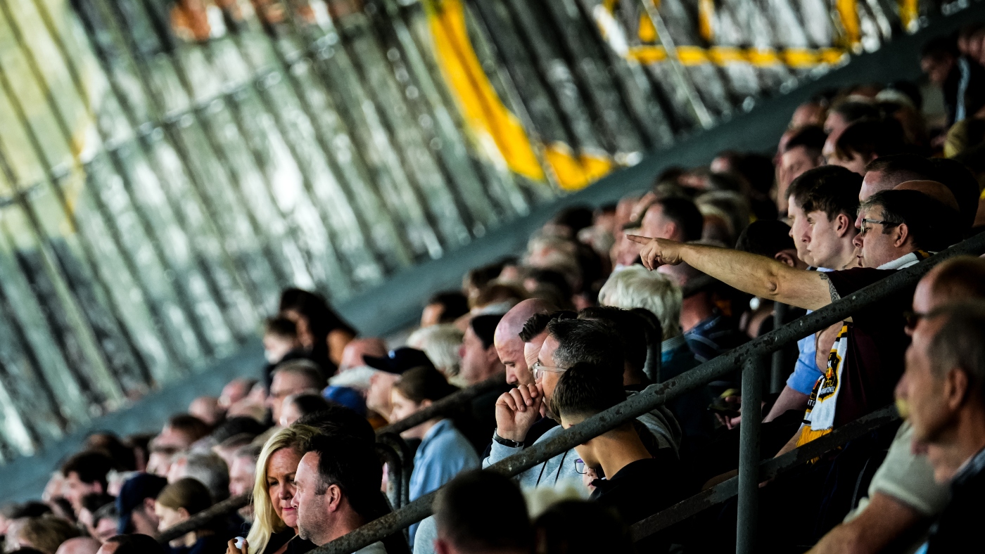 Supporters watching the match from the stand