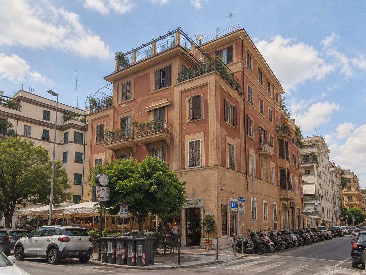 Palazzo d'angolo romano con terrazze e bar al piano strada
