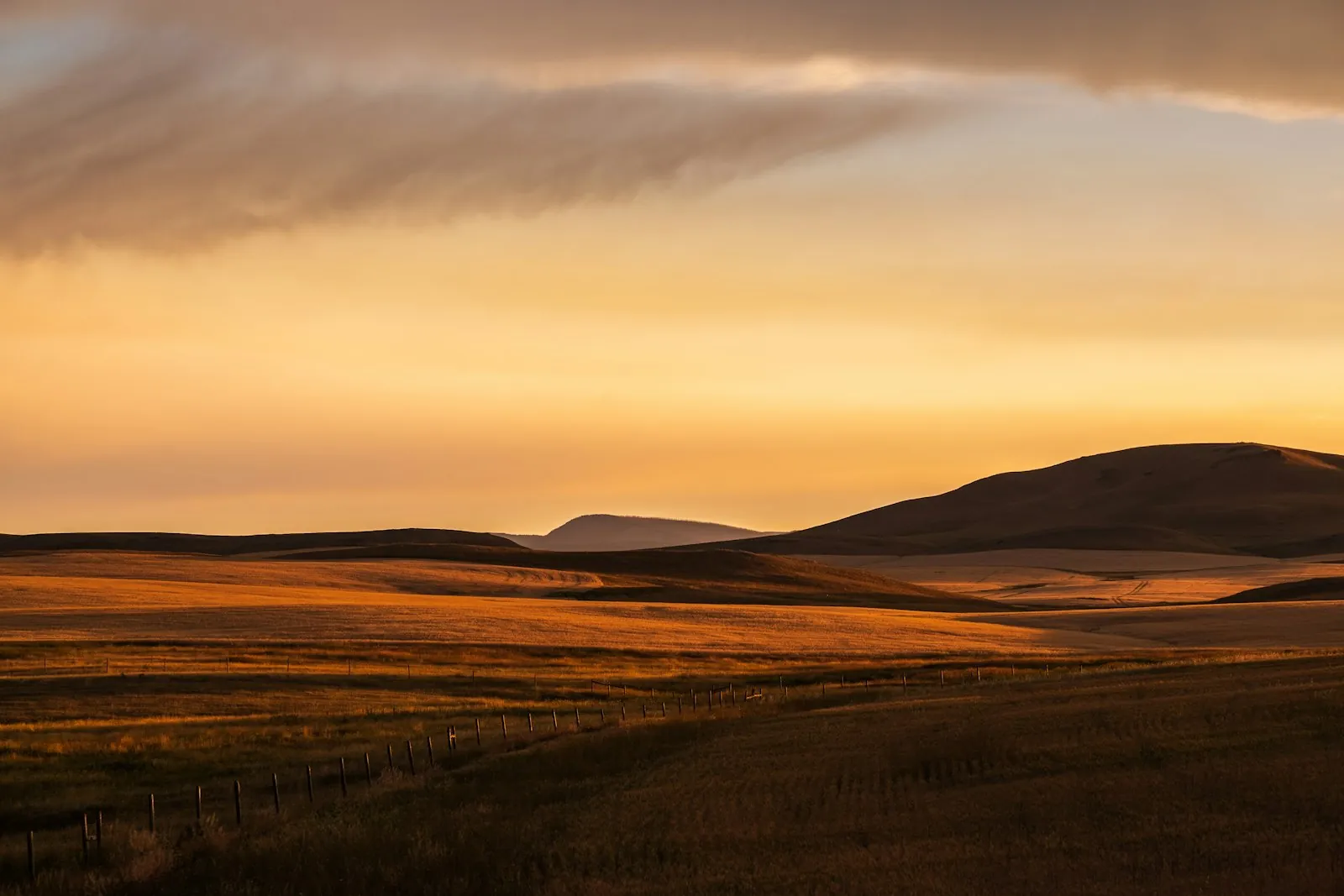 Rolling Nebraska plains at sunset
