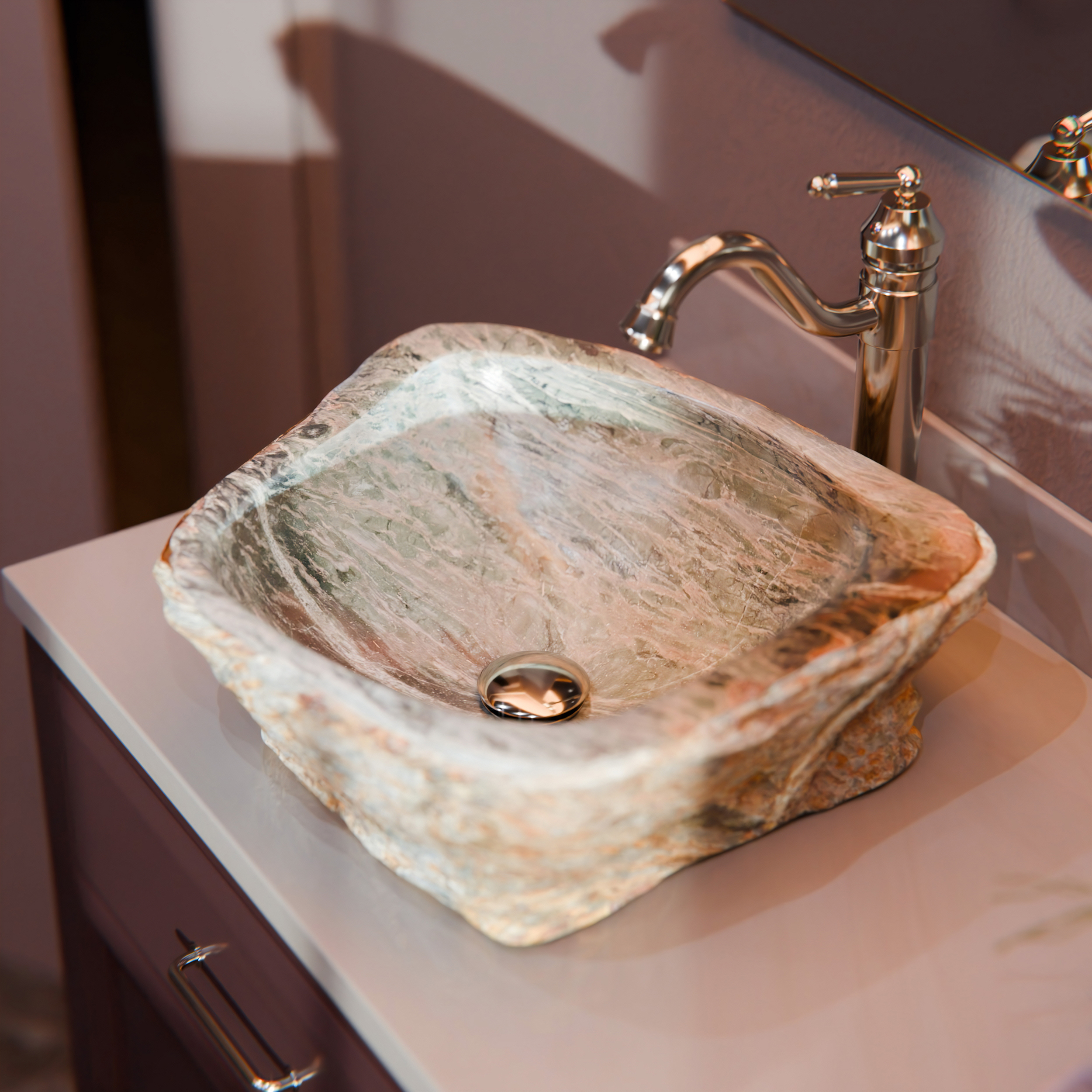 A natural cobbletone sink from Novatto's catalog of stone bath vessel sinks.