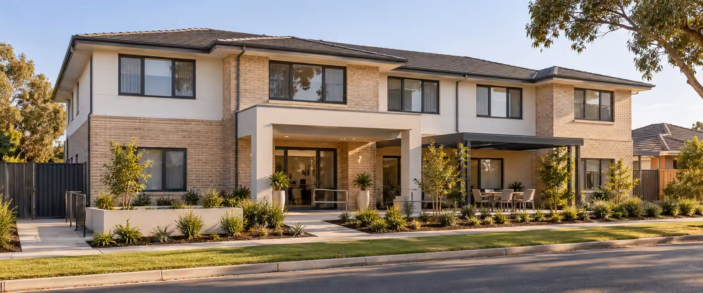 Large two-storey brick and render house with a covered outdoor area