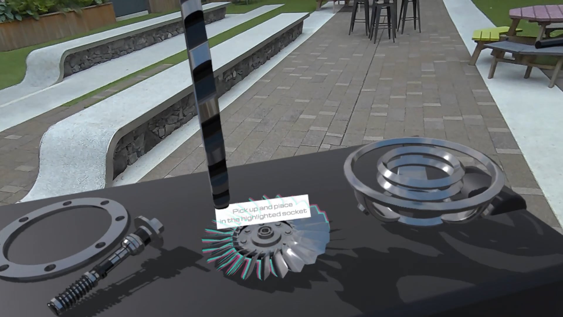 Cognetic AR demo: parts on a virtual workbench with a pick up and place instruction