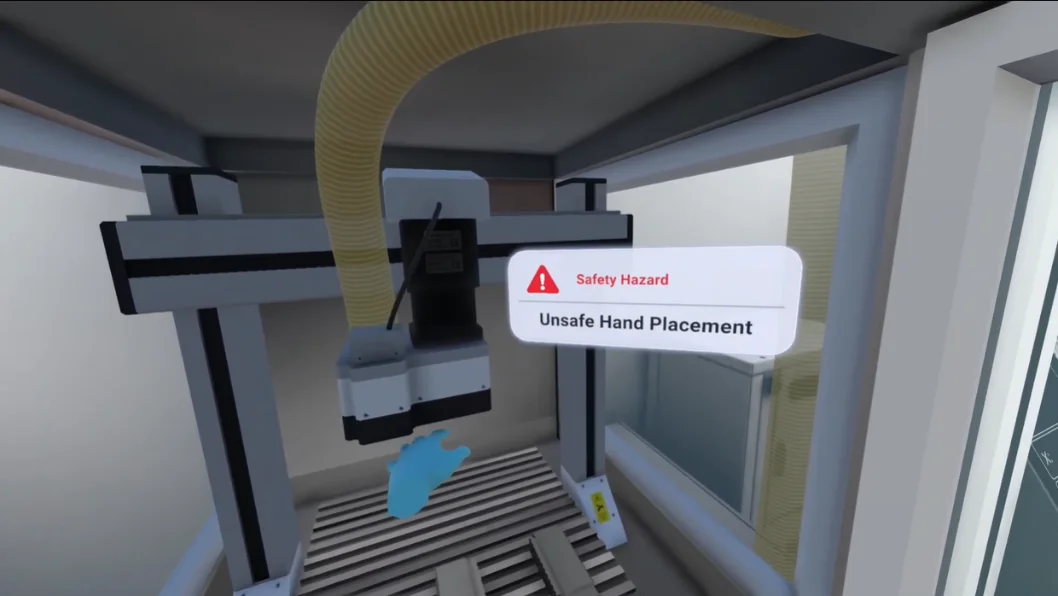 The simulation flags unsafe hand placement near the cutting head