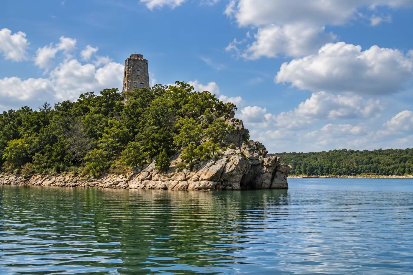 Tucker Tower on its rocky wooded headland above Lake Murray