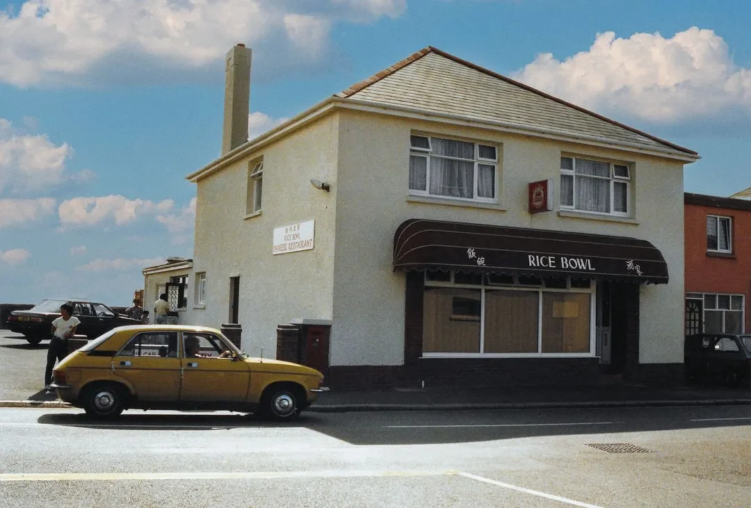 Archive photo of the original Rice Bowl restaurant building with a vintage car outside, St Clement, Jersey