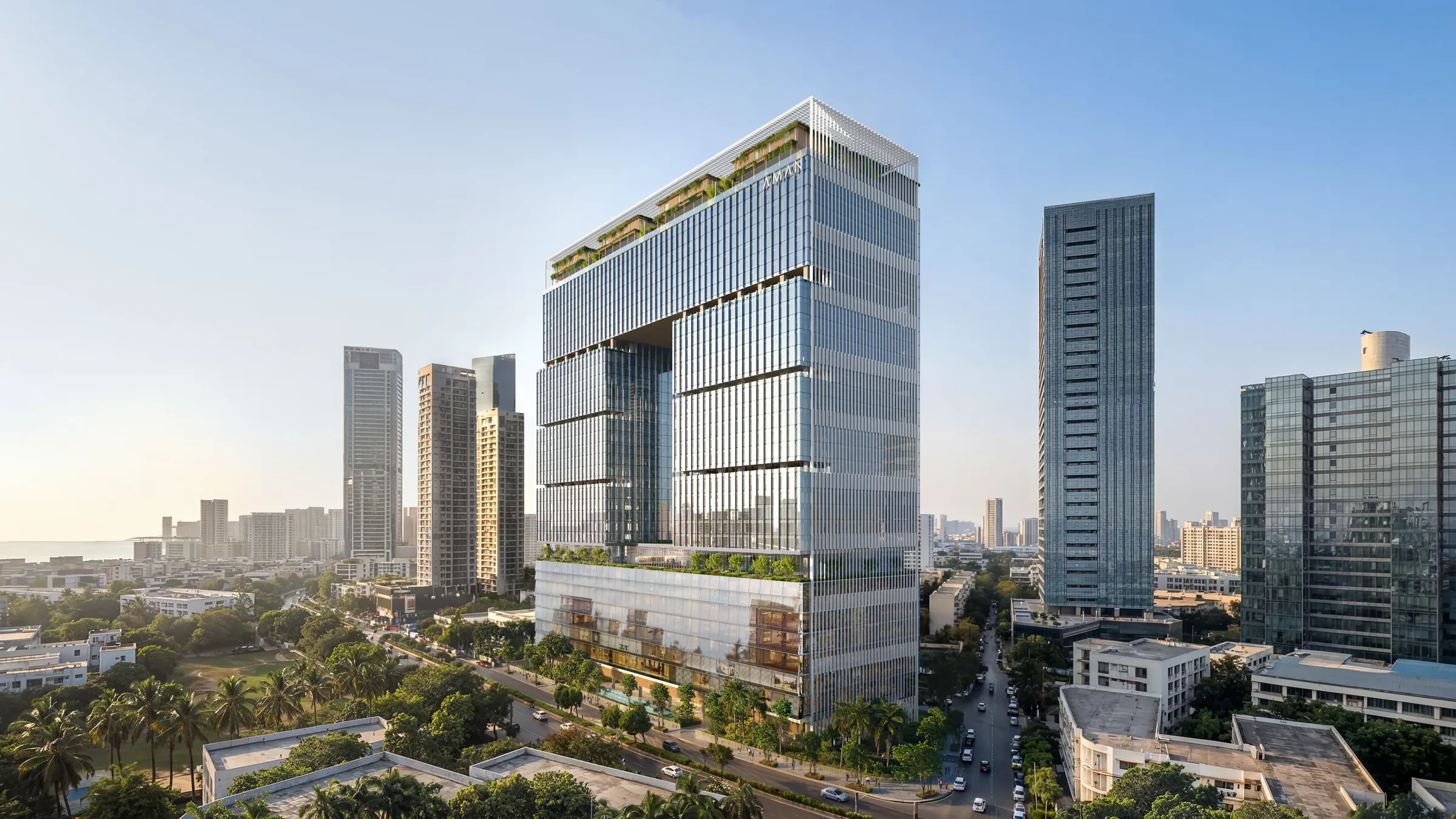 Visualisation of Worli Mall, a glass building with twin towers above, in the Mumbai skyline
