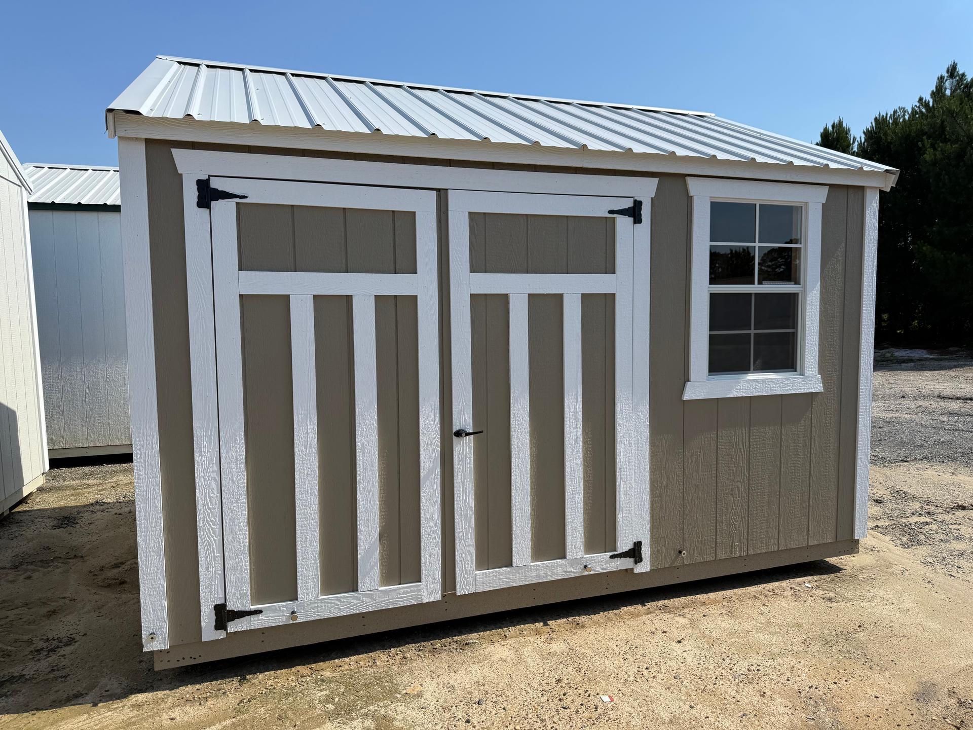 Standard Utility 10x12 portable building in Tanglewood