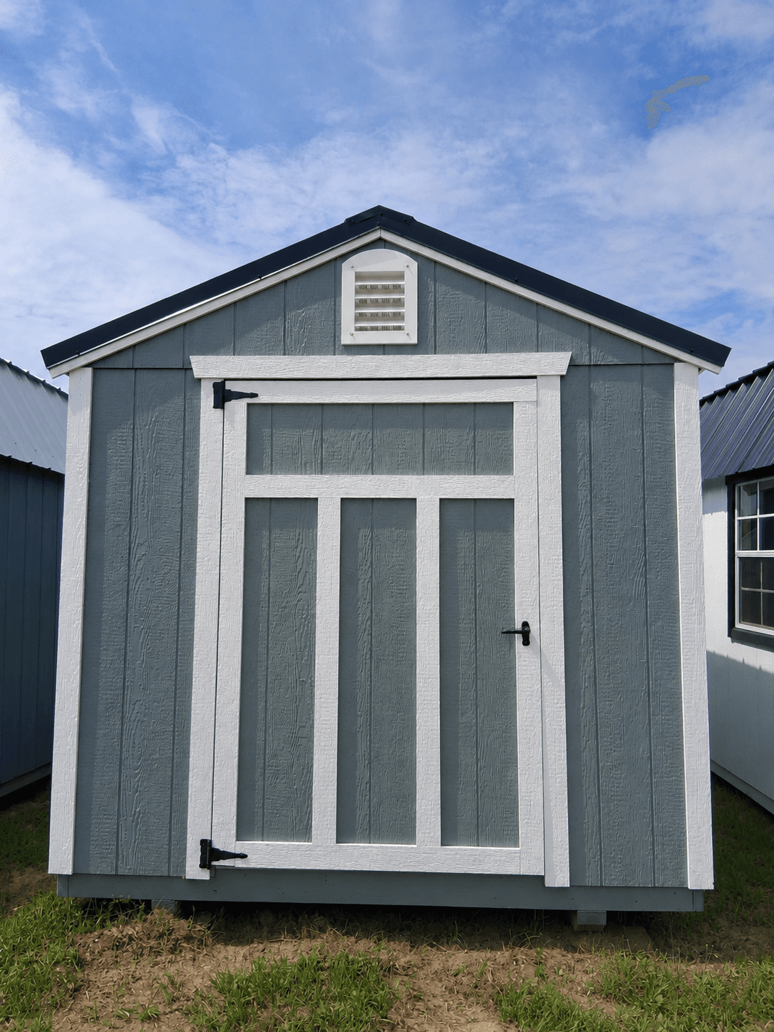 Standard Utility 8x12 portable building in Rough Ride