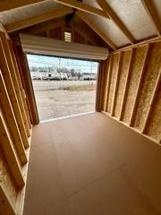 Standard Utility 10x12 portable building in Rustic Red