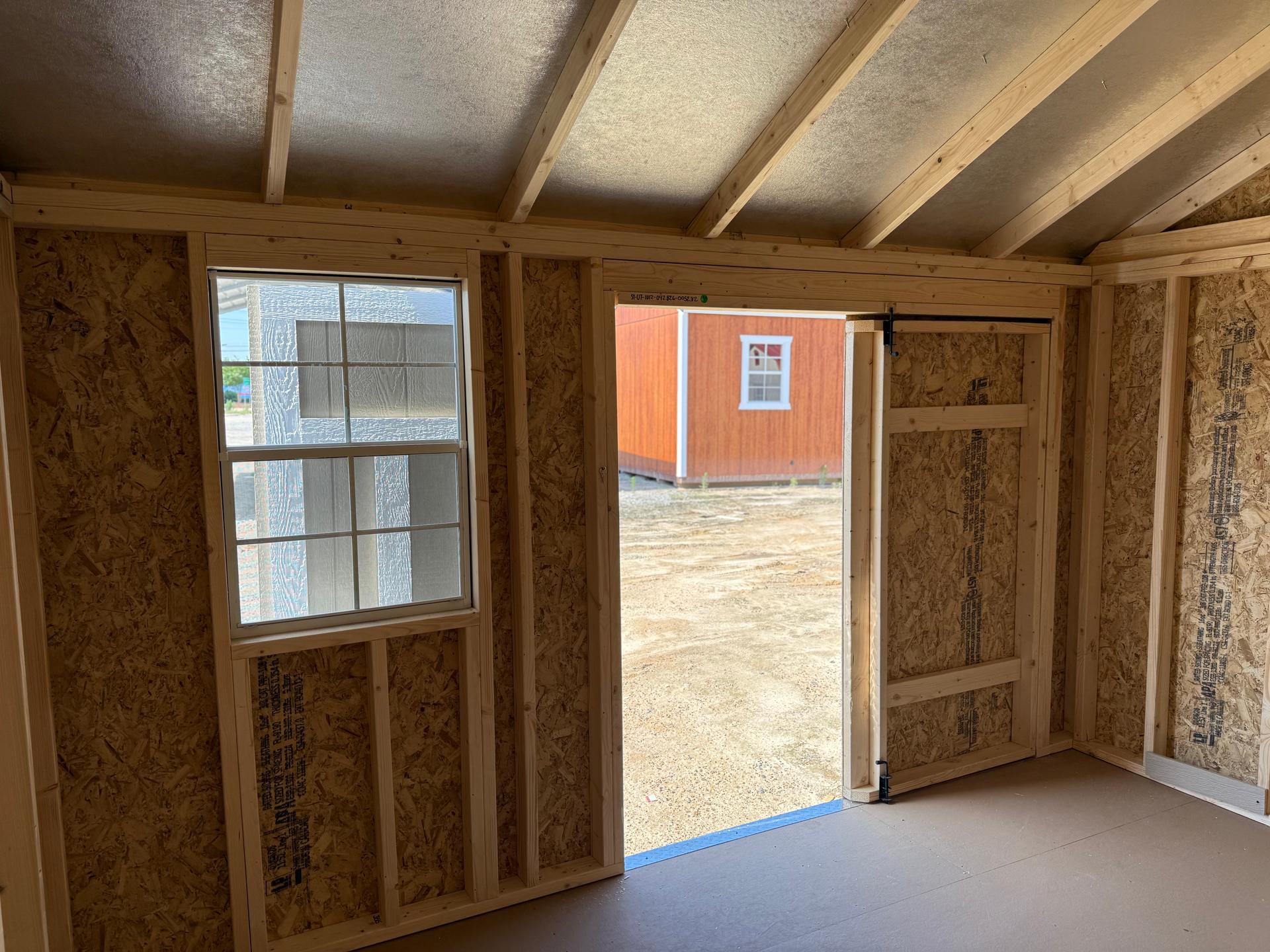 Standard Utility 10x12 portable building in Tanglewood