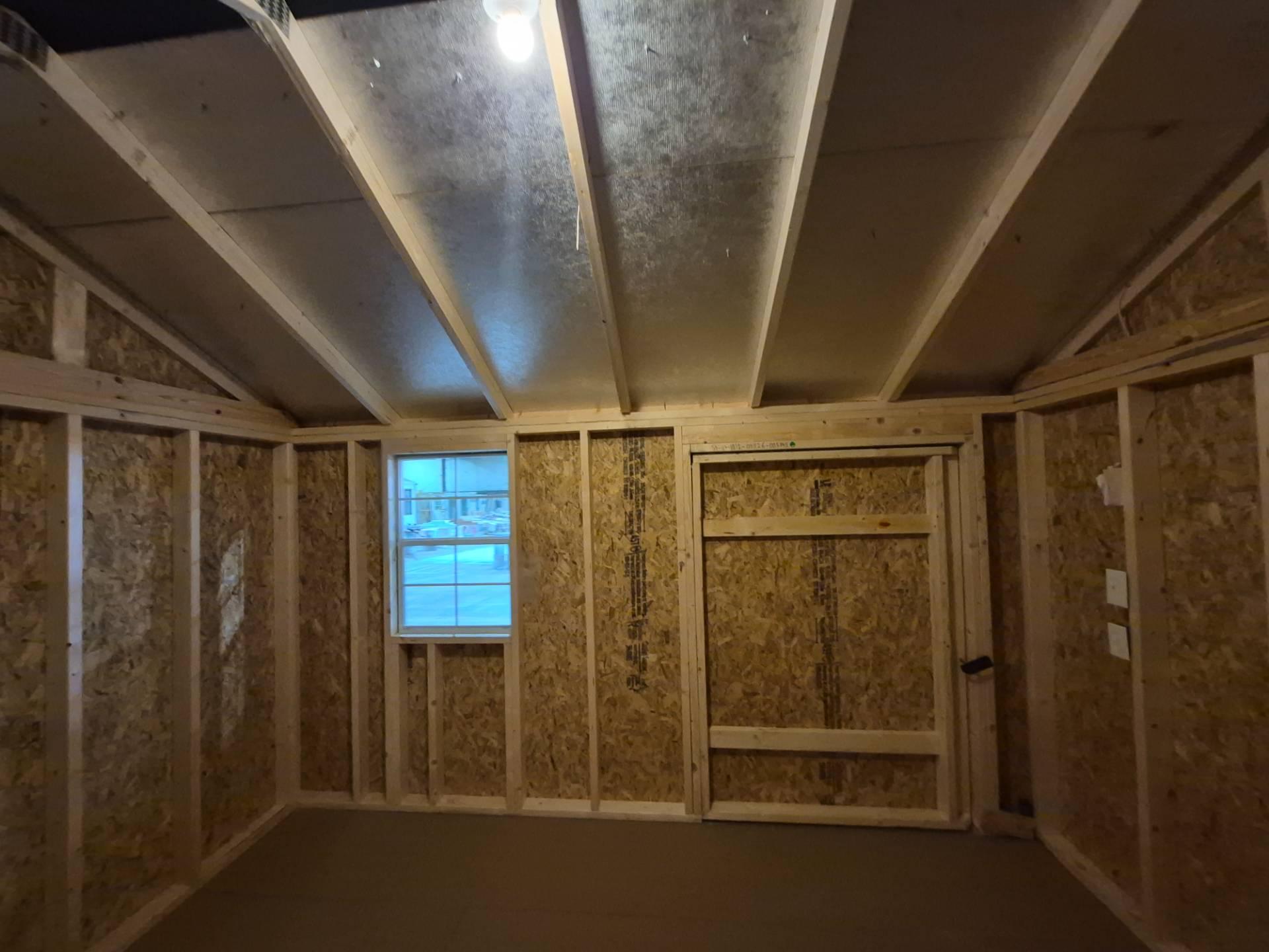 Standard Utility 10x12 portable building in Navajo White