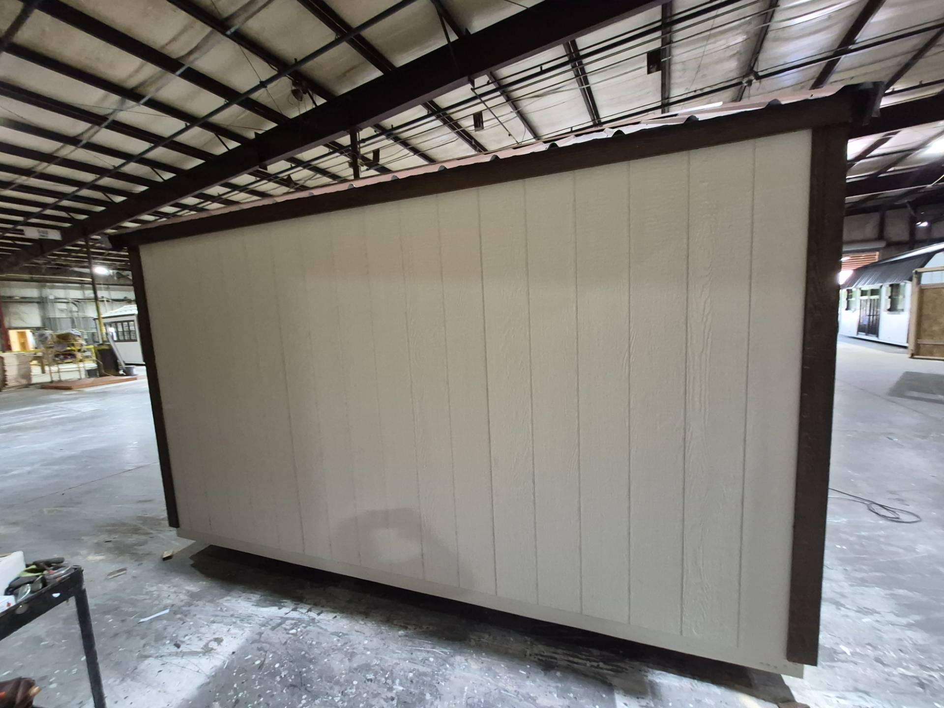 Standard Utility 10x12 portable building in Navajo White