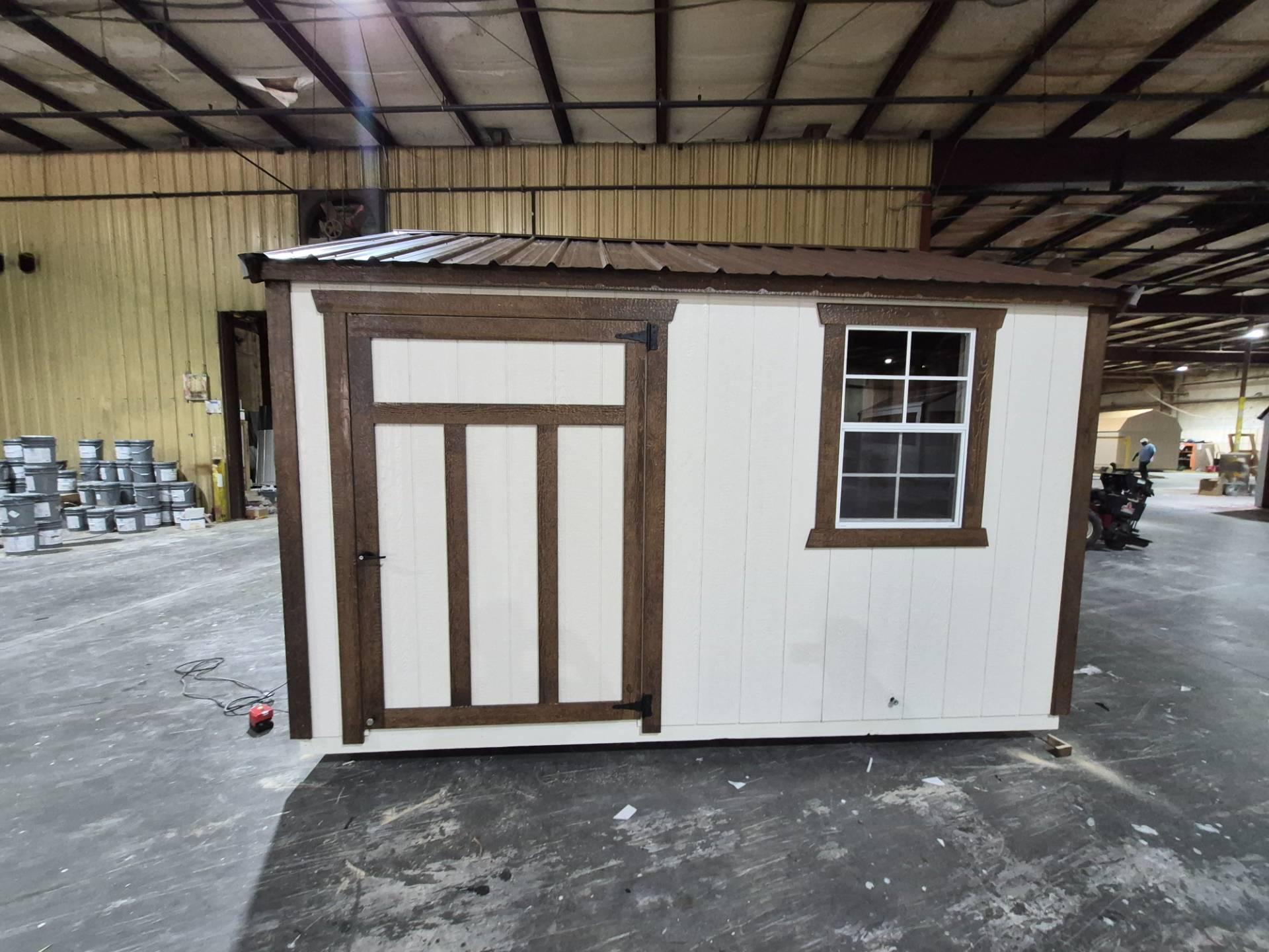 Standard Utility 10x12 portable building in Navajo White