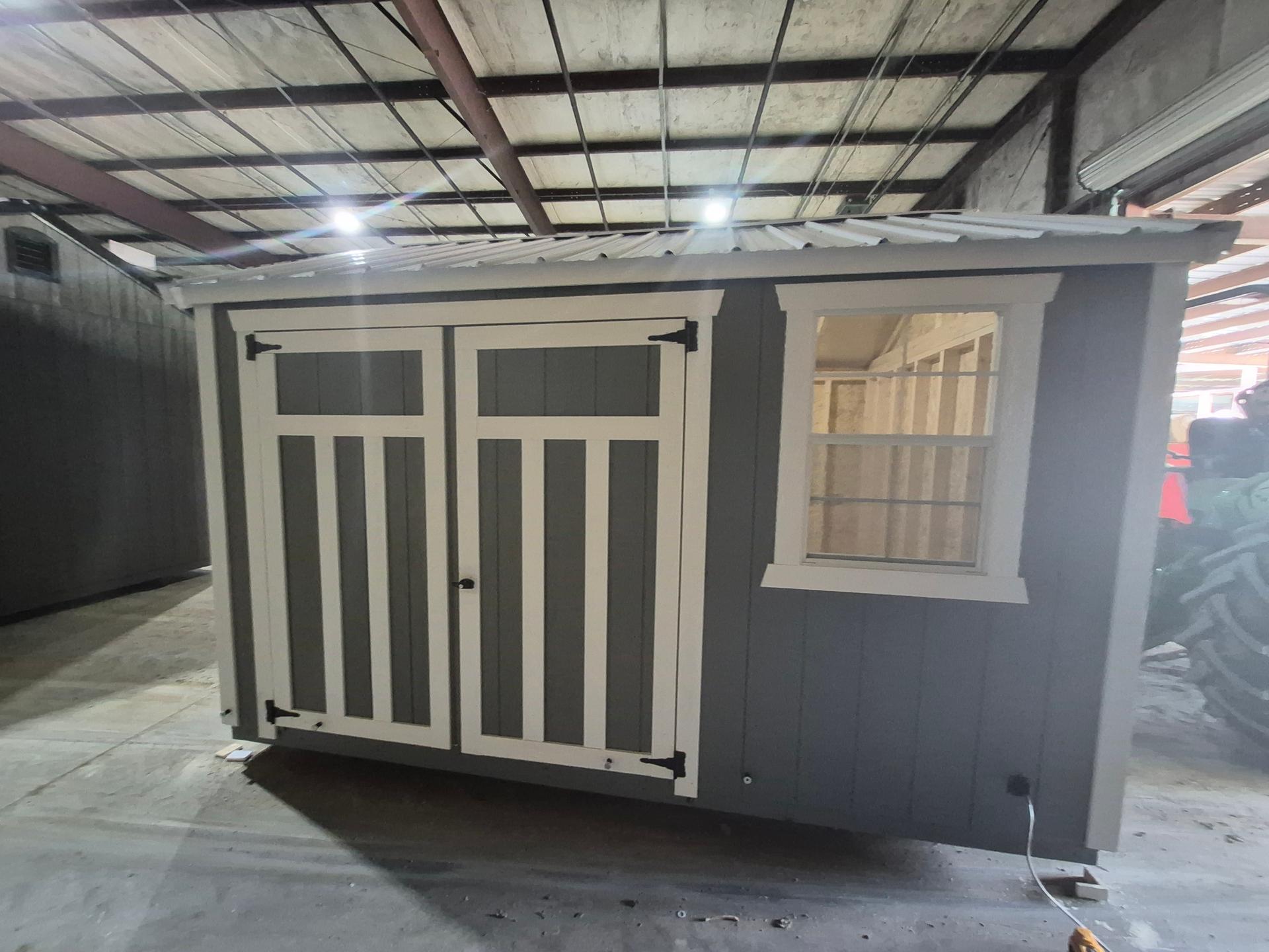 Standard Utility 10x12 portable building in Phoenix Gray