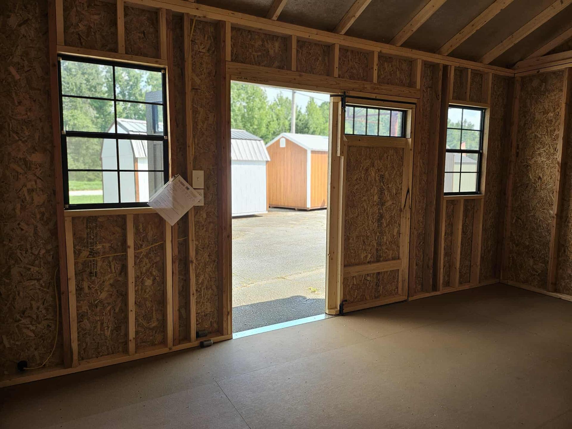 Standard Utility 10x16 portable building in Barnwood Grey