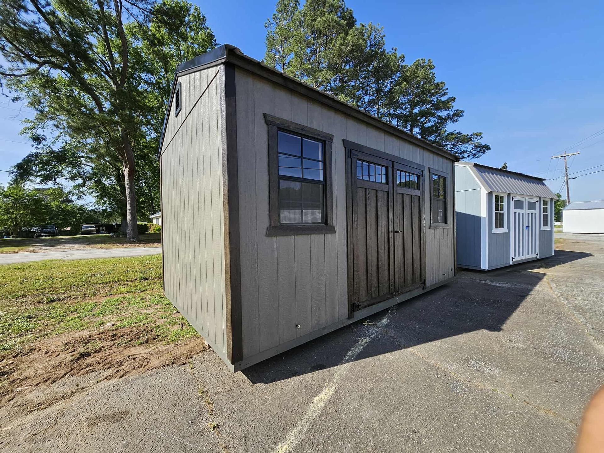 Standard Utility 10x16 portable building in Barnwood Grey